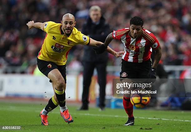 Patrick van Aanholt of Sunderlandvies with Nordin Amrabat of Watford during the Premier League match between Sunderland and Watford at Stadium of...