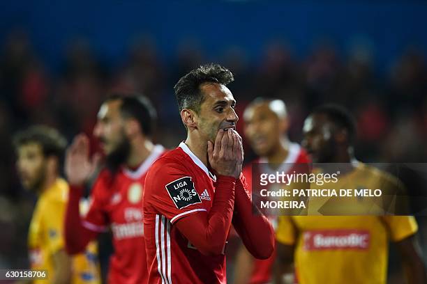 Benfica's Brazilian forward Jonas Oliveira gestures after missing a goal opportunity during the Portuguese league football match GD Estoril Praia vs...