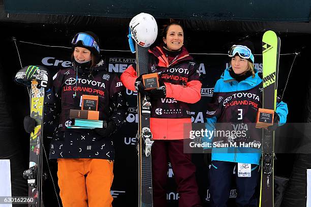 Annalisa Drew in second place, Marie Martinod of France in first place and Devin Logan in third place celebrate on the podium in the final round of...