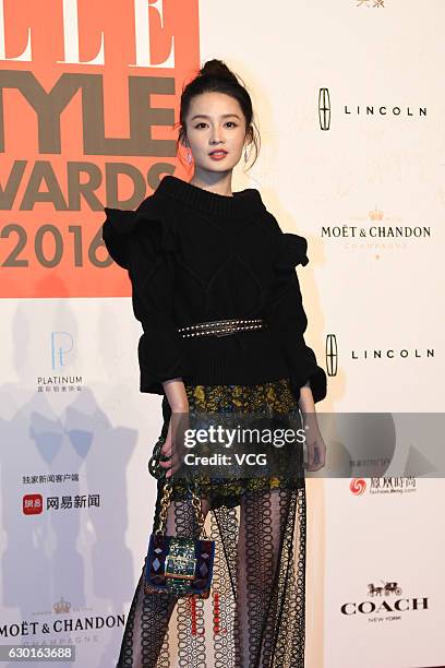 Actress Li Qin poses at the red carpet of 2016 ELLE Style Awards ceremony on December 16, 2016 in Shanghai, China.
