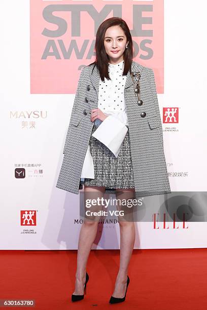 Actress Yang Mi poses at the red carpet of 2016 ELLE Style Awards ceremony on December 16, 2016 in Shanghai, China.