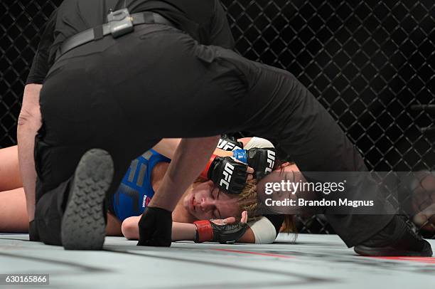 Michelle Waterson submits Paige VanZant in their women's strawweight bout during the UFC Fight Night event inside the Golden 1 Center Arena on...