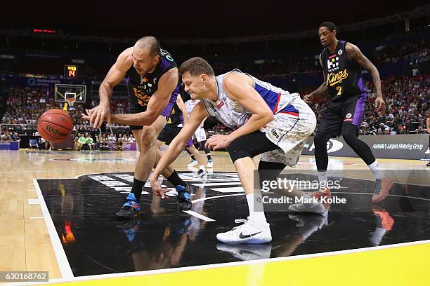 Aleks Maric of the Kings and Daniel Johnson of the Adelaide 36ers compete for the ball during the round 11 NBL match between Sydney and Adelaide on...