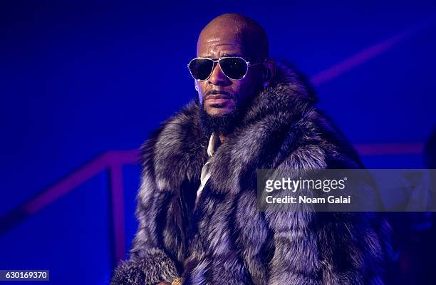 Singer R. Kelly performs in concert during the '12 Nights Of Christmas' tour at Kings Theatre on December 17, 2016 in the Brooklyn borough New York...
