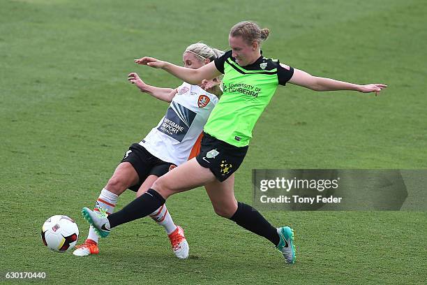 Clare Polkinghorne of Canberra contests the ball during the round seven W-League match between Canberra and Brisbane at Central Coast Stadium on...