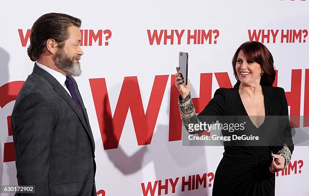 Actors Megan Mullally and husband Nick Offerman arrive at the premiere of 20th Century Fox's "Why Him?" at Regency Bruin Theater on December 17, 2016...