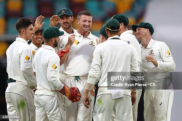 Jackson Bird of Australia celebrates after taking the wicket of Misbah-ul-Haq of Pakistan during day four of the First Test match between Australia...