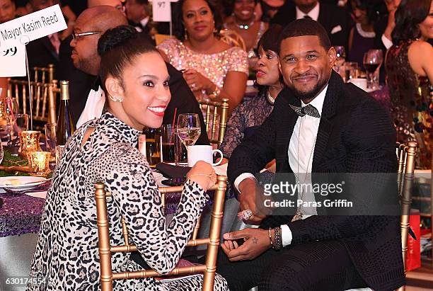 Grace Miguel and Usher Raymond attend 33rd Annual UNCF Mayor's Masked Ball at Atlanta Marriott Marquis on December 17, 2016 in Atlanta, Georgia.