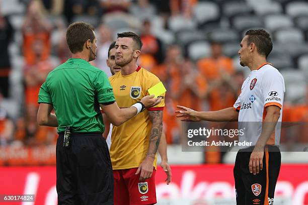 Roy O'Donovan of the Mariners receives a yellow card during the round 11 A-League match between the Central Coast Mariners and Brisbane Roar at...