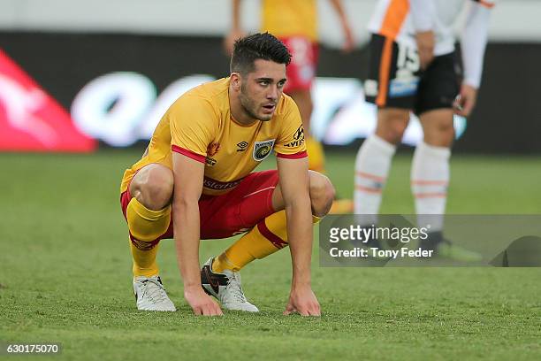 Harry Ascroft of the Mariners looks dejected after losing to the Roar during the round 11 A-League match between the Central Coast Mariners and...