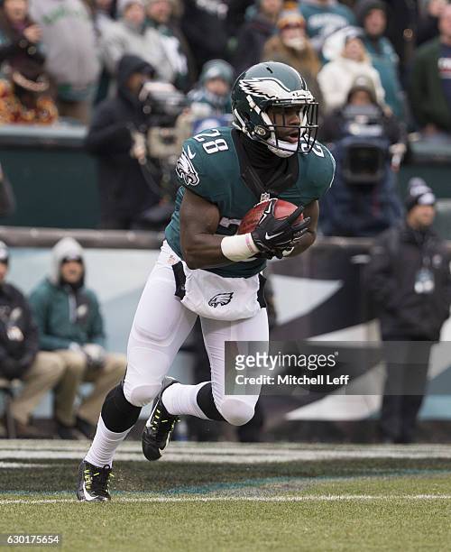 Wendell Smallwood of the Philadelphia Eagles runs with the ball against the Washington Redskins at Lincoln Financial Field on December 11, 2016 in...