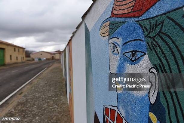 Replicas of works by Spanish artist Pablo Picasso on a wall.