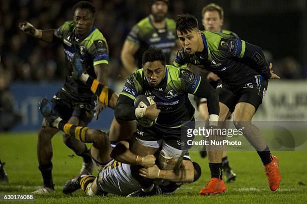 Bundee Aki of Connacht tackled during the European Rugby Champions Cup Round 4 match between Connacht Rugby and Wasps at the Sportsground in Galway,...