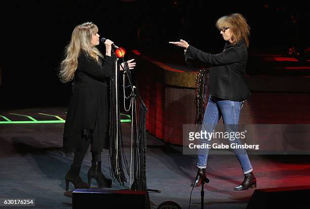 Singer/songwriter Stevie Nicks is joined onstage by recording artist Chrissie Hynde of The Pretenders during the grand opening of Park Theater at...