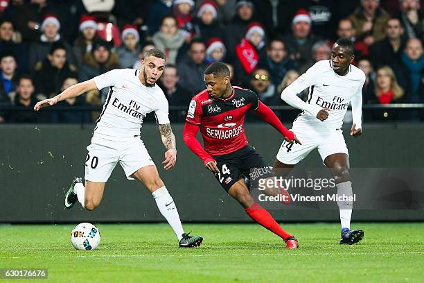 Layvin Kurzawa of Paris Saint Germain and Marcus Coco of Guingamp during the French Ligue 1 match between Guingamp and Paris Saint Germain at Stade...