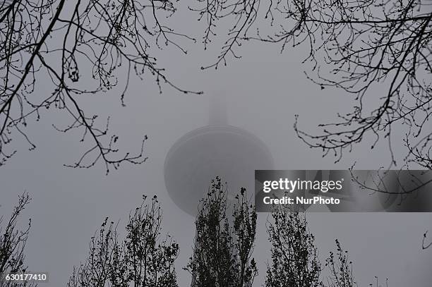 Photo taken from the Dragon tower,a supertall skyscraper under construction at the Nangang district, shows the city being shrouded in heavy smog on...