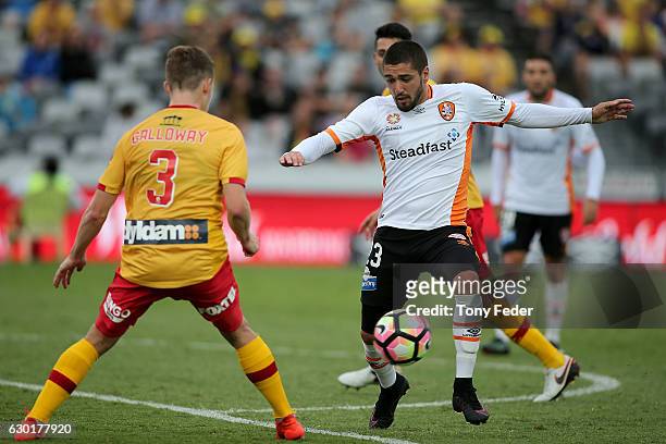 Dimitri Petratos of the Roar contests the ball with Scott Galloway of the Mariners during the round 11 A-League match between the Central Coast...