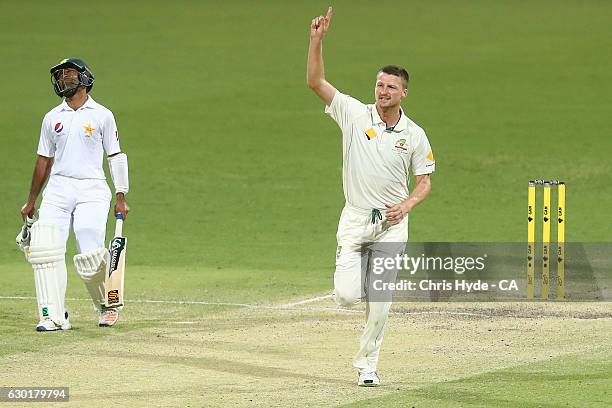 Jackson Bird of Australia celebrates dismissing Muhammad Amir of Pakistan during day four of the First Test match between Australia and Pakistan at...