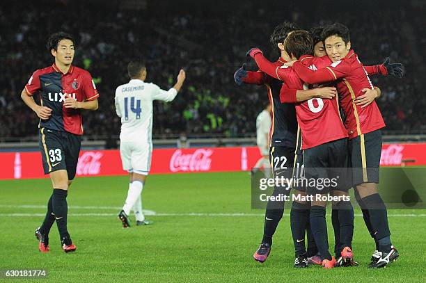 Gaku Shibasaki of Kashima Antlers celebrates scoring a goal with team mates during the FIFA Club World Cup final match between Real Madrid and...