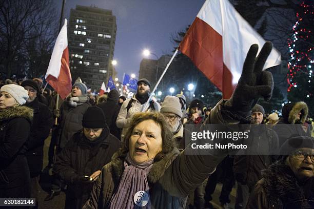Woman during second day of protest near polish Parliament in Warsaw on December 17, 2016