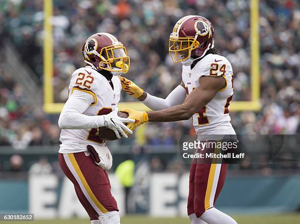Deshazor Everett of the Washington Redskins celebrates with Josh Norman after his interception in the first quarter at Lincoln Financial Field on...