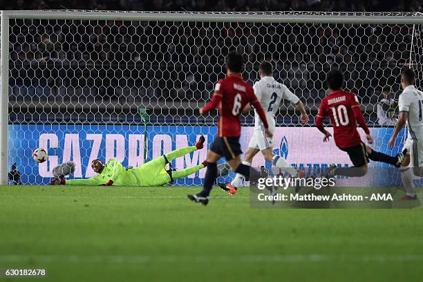 Gaku Shibasaki of Kashima Antlers scores his team's second goal to make the score 1-2 during the FIFA Club World Cup final match between Real Madrid...
