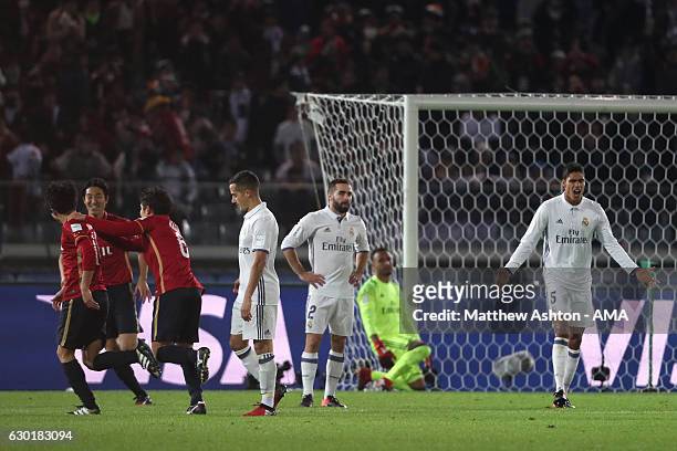 Gaku Shibasaki of Kashima Antlers celebrates scoring his team's second goal to make the score 1-2 with his team-mates during the FIFA Club World Cup...