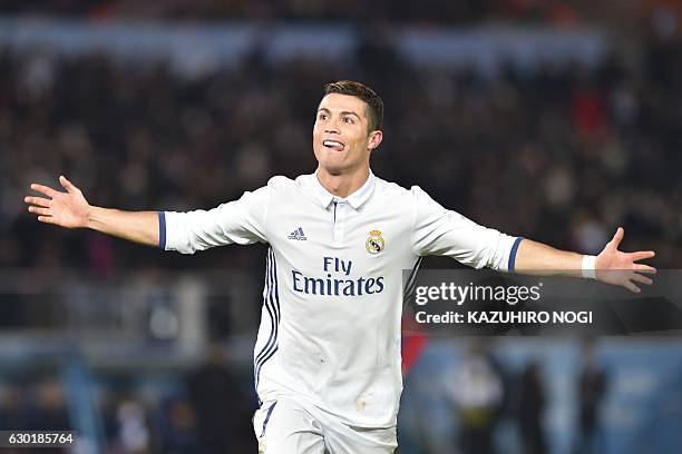 Real Madrid forward Cristiano Ronaldo celebrates scoring during extra-time of the Club World Cup football final match between Kashima Antlers of...