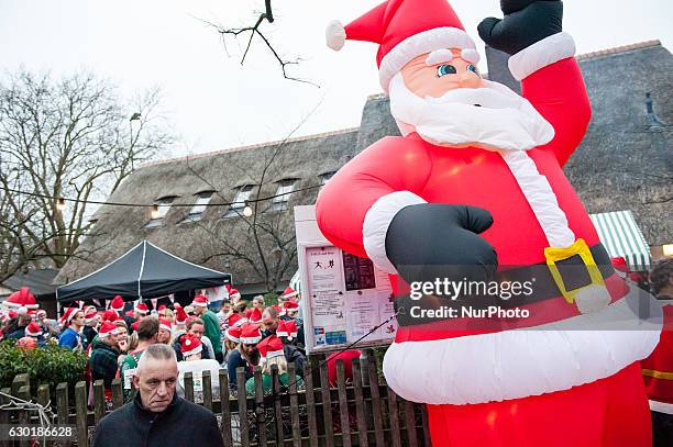 People had the chance to show pride in their ugly sweater as their sweat it out at the national Ugly Sweater Run at the Vondelpark, in Amsterdam on...