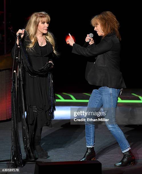 Singer/songwriter Stevie Nicks is joined onstage by recording artist Chrissie Hynde of The Pretenders during the grand opening of Park Theater at...