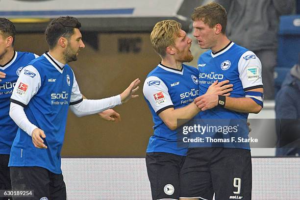 Stephan Salger, Andreas Voglsammer and Fabian Klos of Bielefeld celebrate during the Second Bundesliga match between DSC Arminia Bielefeld and SG...