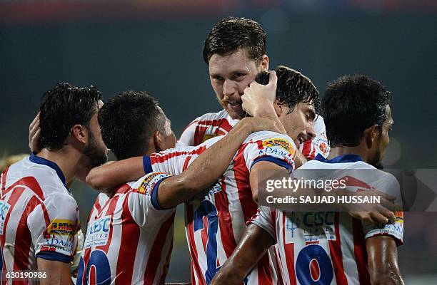 Atletico de Kolkata defender Henrique Fonseca Sereno celebrates after he scores a goal against Kerala Blasters FC during the final Indian Super...