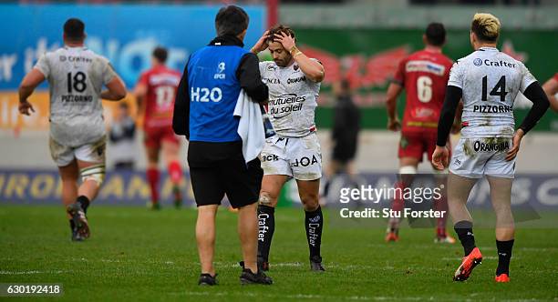 Toulon fullback Leigh Halfpenny reacts after his last minute penalty kick misses during the European Rugby Champions Cup match between Scarlets and...