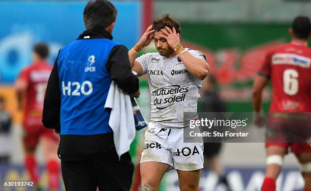 Toulon fullback Leigh Halfpenny reacts after his last minute penalty kick misses during the European Rugby Champions Cup match between Scarlets and...