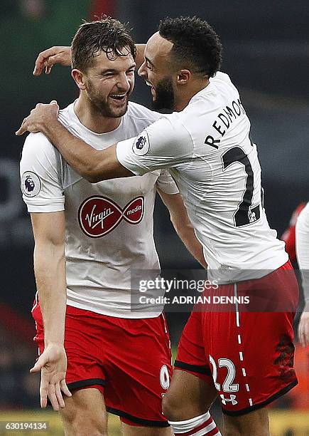 Southampton's English striker Jay Rodriguez celebrates scoring his team's third goal with Southampton's English midfielder Nathan Redmond during the...