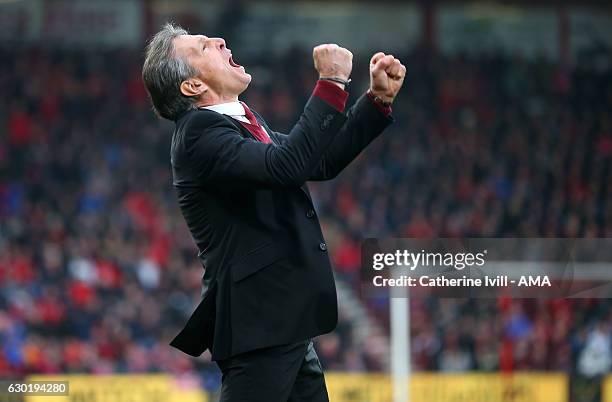 Claude Puel manager of Southampton celebrates after Jay Rodriguez of Southampton scores a goal to make it 1-3 during the Premier League match between...