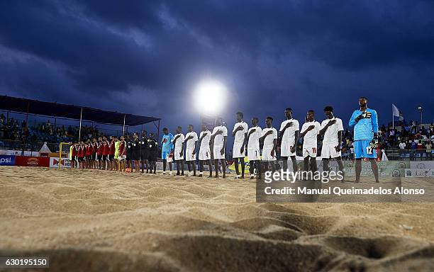 The Senegal team stand for the national anthem prior to the day fourth of the CAF Beach Soccer Africa Cup of Nations match between Senegal and Egypt...