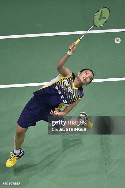 Tai Tzu Ying of Taiwan hits a return during her women's singles final match against Sung Ji Hyun of Korea on the 5th day of the BWF Dubai World...