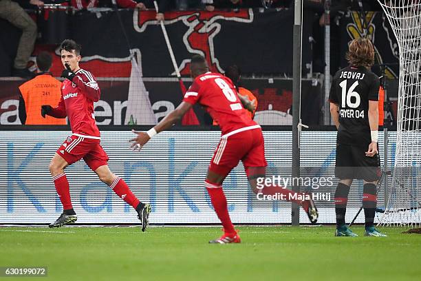 Alfredo Morales of Ingolstadt celebrates after scoring a goal to make it 0-1 during the Bundesliga match between Bayer 04 Leverkusen and FC...