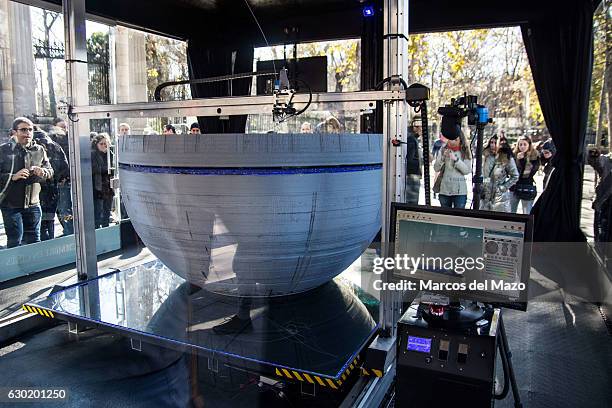 Large printer making a copy of Star Wars Death Star coinciding with the release of Rogue One film.