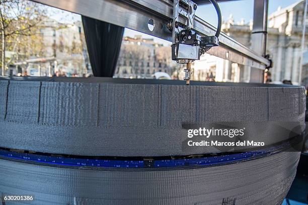 Large printer making a copy of Star Wars Death Star coinciding with the release of Rogue One film.