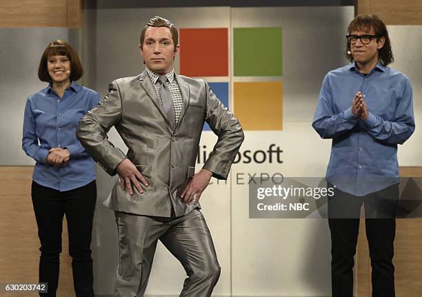 Casey Affleck" Episode 1714 -- Pictured: Kate McKinnon, Beck Bennett, and Fred Armisen during the "Robot Presentation" sketch on December 17, 2016 --