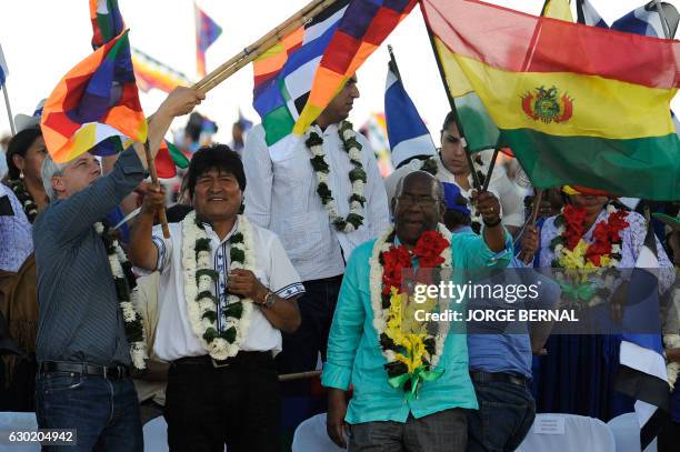 Bolivia's President Evo Morales , Vice President Alvaro Garcia LInera and Venezuela's Vice President Aristobulo Isturiz take part in the "Day of...
