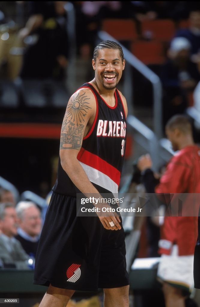 Haw Rasheed Wallace Rasheed Wallace of the Portland TrailBlazers smiles as he walks on ...