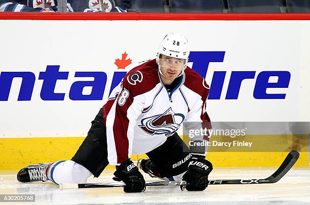 Patrick Wiercioch of the Colorado Avalanche takes part in the pre-game warm up prior to NHL action against the Winnipeg Jets at the MTS Centre on...