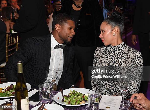 Usher Raymond and Grace Miguel attend the 33rd annual UNCF Mayors Masked Ball at Atlanta Marriott Marquis on December 17, 2016 in Atlanta, Georgia.