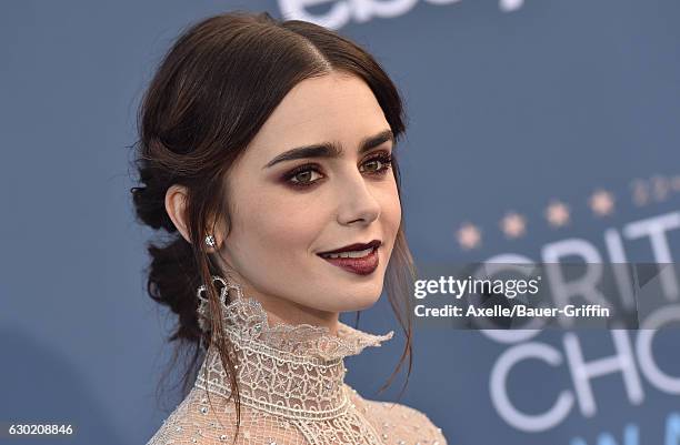 Actress Lily Collins arrives at The 22nd Annual Critics' Choice Awards at Barker Hangar on December 11, 2016 in Santa Monica, California.