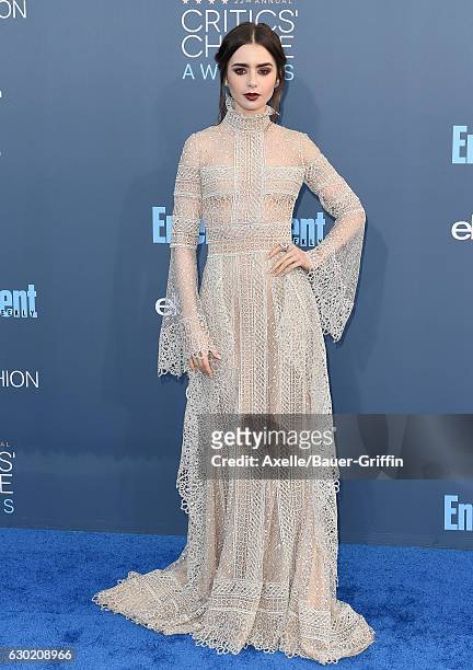 Actress Lily Collins arrives at The 22nd Annual Critics' Choice Awards at Barker Hangar on December 11, 2016 in Santa Monica, California.