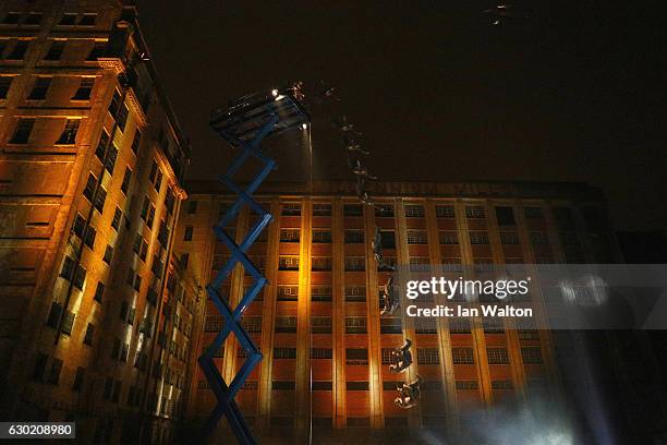 Stuntman Dave Grant performs near to a 100ft 'Leap of Faith' freefall live on air during Channel 4 ad break to mark the release of Assassin's Creed'...