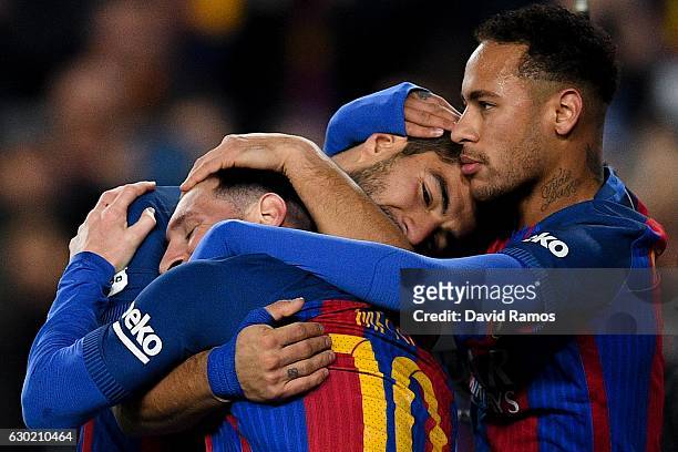Luis Suarez of FC Barcelona celebrates with his team mates Lionel Messi and Neymar Jr.after scoring his team's second goal during the La Liga match...